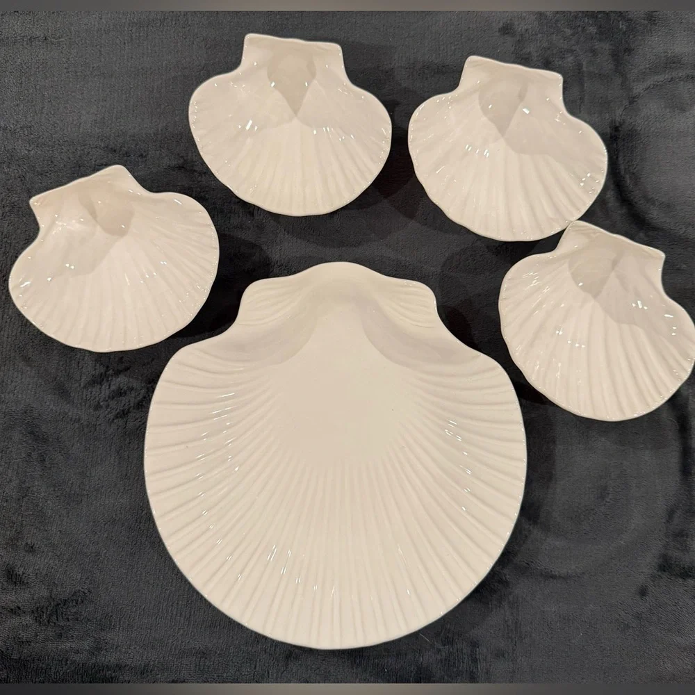 4 Sur La Table white, shell bowls. 5.5”